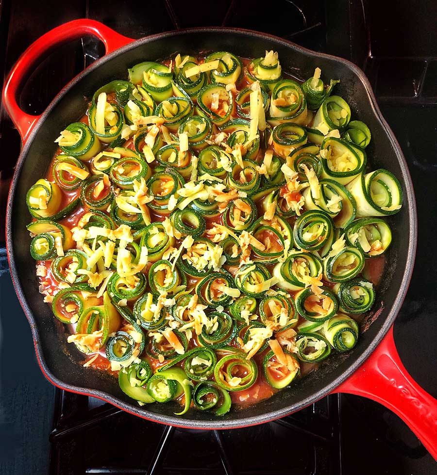 Rolled Zucchinis before they are placed int he oven